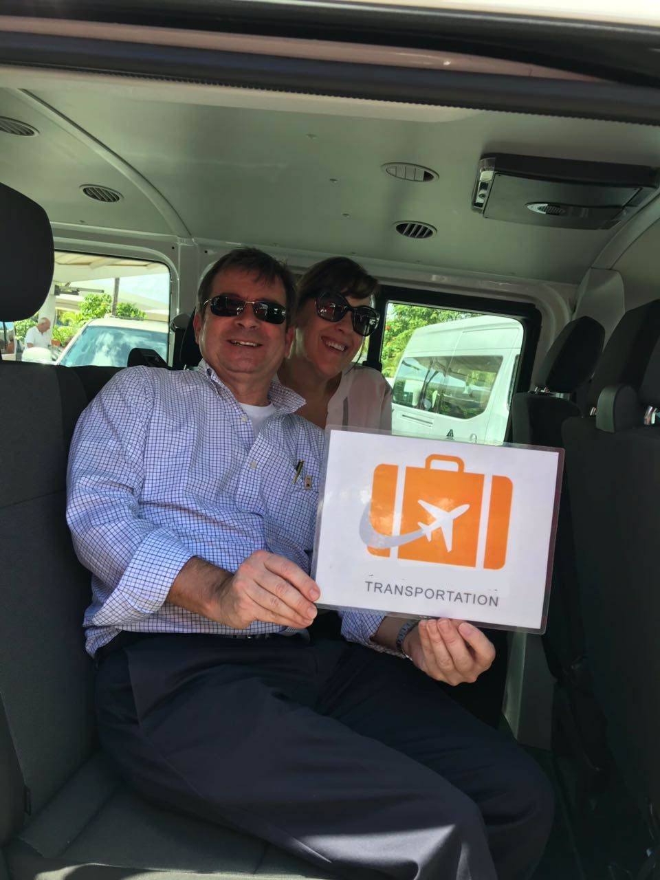 Adults couple being transported to their accommodation